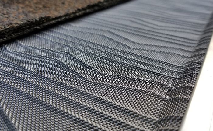 A close up of a piece of fabric with a pattern on it.